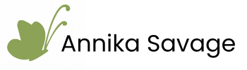Simple green butterfly with the words Annika Savage next to it